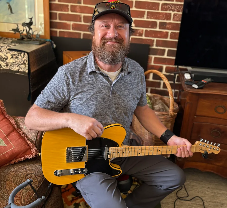 Robert Browne with his electric guitar